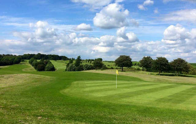 A sunny day view of a hole at Kilton Forest Golf Club.