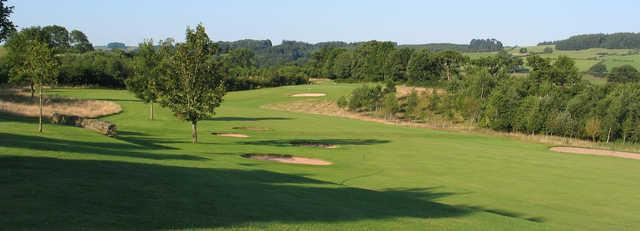 A sunny day view of a fairway at Kirkby Lonsdale Golf Club.