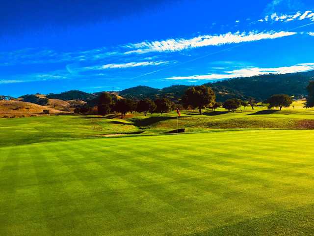 A sunny day view of a hole at San Juan Oaks Golf Club.