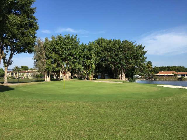 A sunny day view of a green at Costa Del Sol Golf Club.