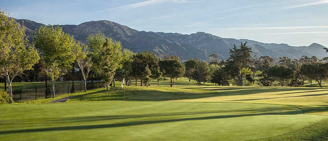 A view of hole #1 and the Santa Ynez Mountains in the distance at Santa Barbara Golf Club.