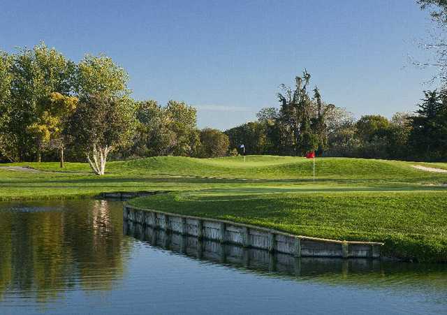 A view of a green surrounded by water at Buenaventura Golf Course.