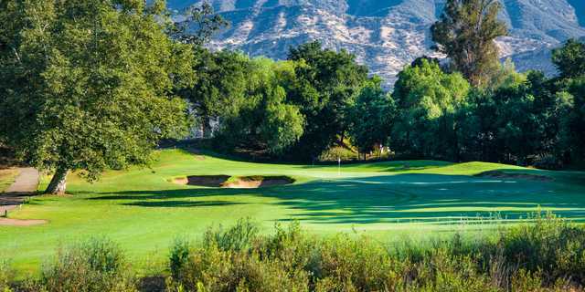 A sunny day view of a hole at Soule Park Golf Club.