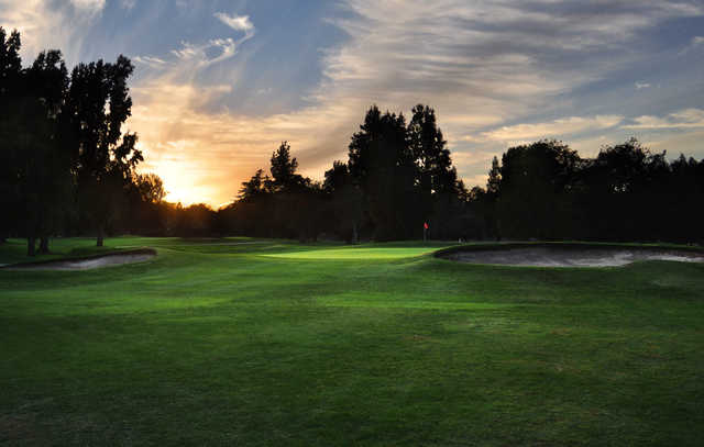 A view of hole #6 surrounded by sunset light at Ancil Hoffman Golf Course.