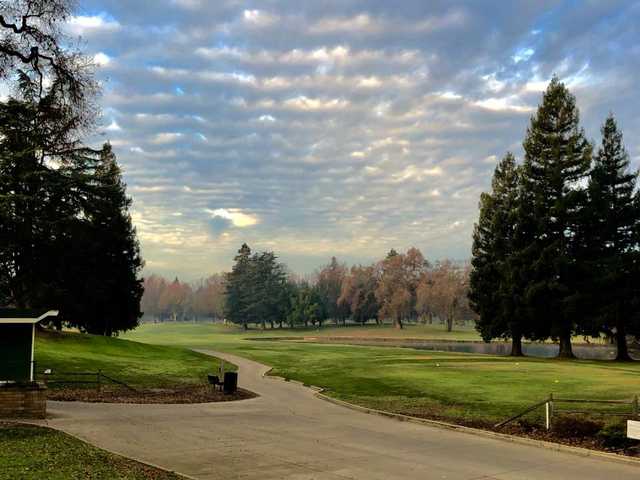 A view of a tee covered by a nice cloud curtain at Ancil Hoffman Golf Course.