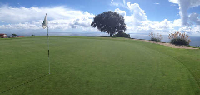 A view of hole #15 with water in the distance at Los Verdes Golf Course.