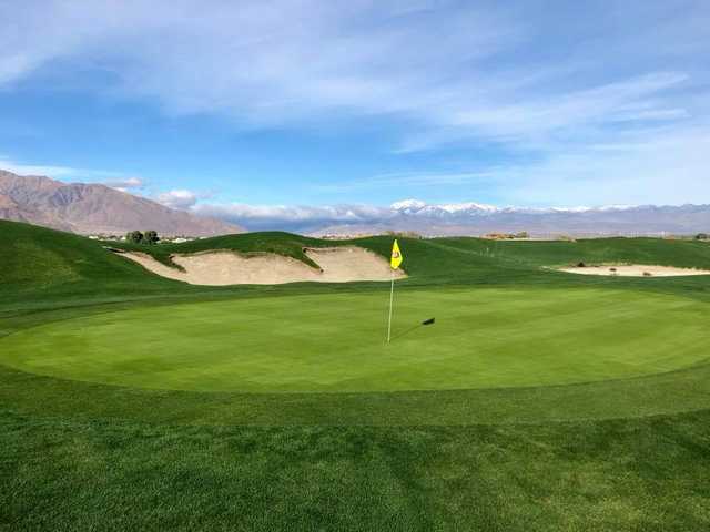 A sunny day view of a green at Cimarron Golf Club.