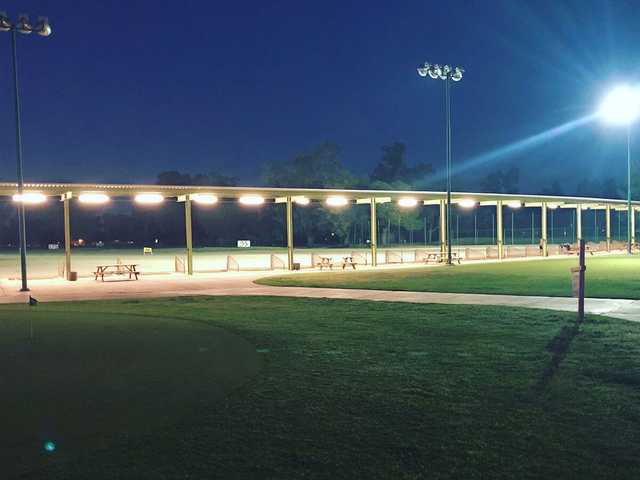 An evening view of the driving range at Glen Lakes Golf Course.