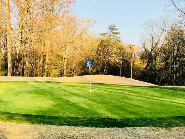 A sunny day view of a hole at Lee's Hill Golf Club.