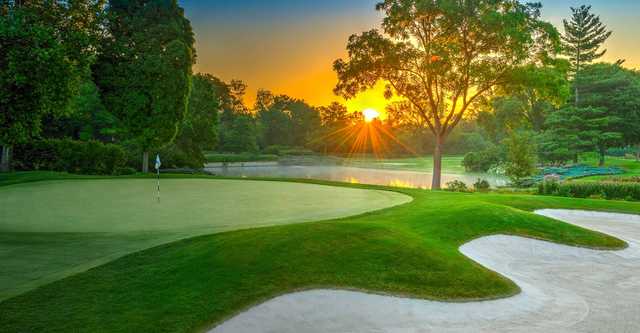 A sunset view of a hole at Glen Oak Country Club.