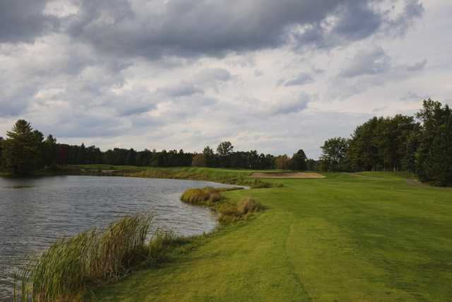 The par-4 13th hole on the Monarch Course at Garland Lodge & Resort features large traps on either side of the fairway