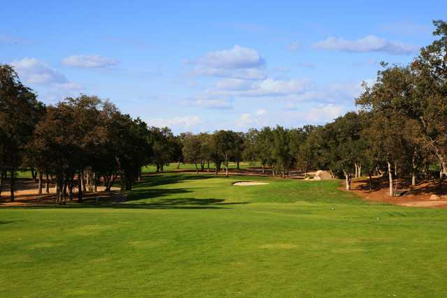 A sunny day view of a hole at Turkey Creek Golf Club.