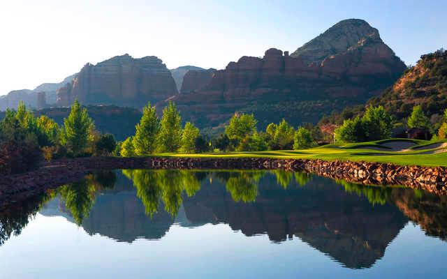A view over the water of a hole at Seven Canyons Golf Club.