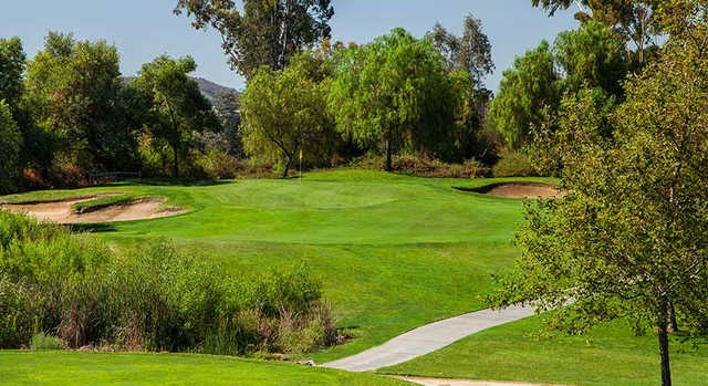 A view of a green flanked by bunkers at Reidy Creek Golf Course.