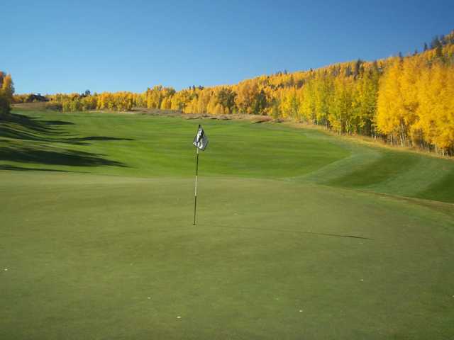 A splendid fall day view of a green at The Raven Golf Club from Three Peaks.