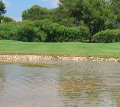 A view over the water of green at Carrick Knowe Golf Course