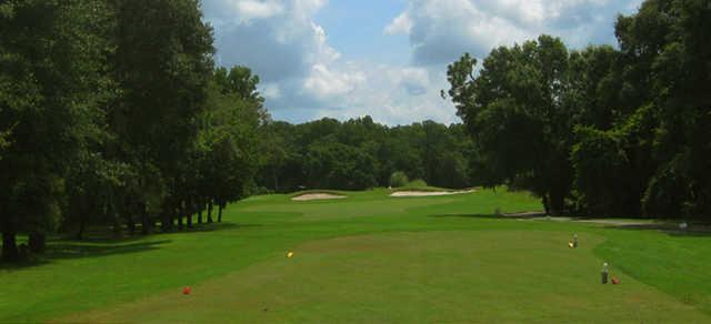 A sunny day view from a tee at River Ridge Golf Club.