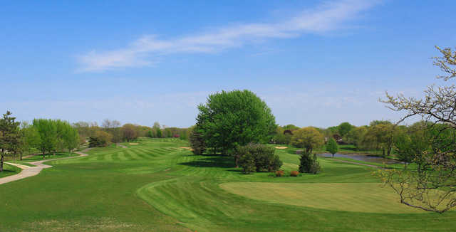A sunny day view from Arlington Lakes Golf Club.