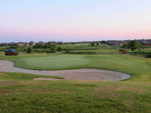 A view of a well protected hole from the Frisco Lakes Golf Club