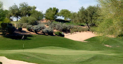 A view of a hole protected by bunkers at Legendary Oaks Golf Course