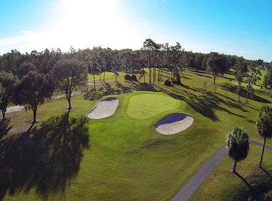 A view of a green flanked by bunkers at Quail Hollow Golf Course