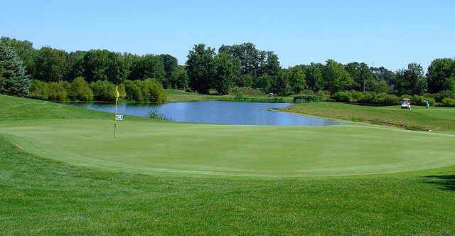 A view of green #9 with water coming into play at The Sanctuary Golf Club.