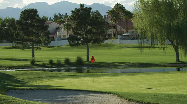 A sunny day view of a hole at Spanish Trail Country Club.