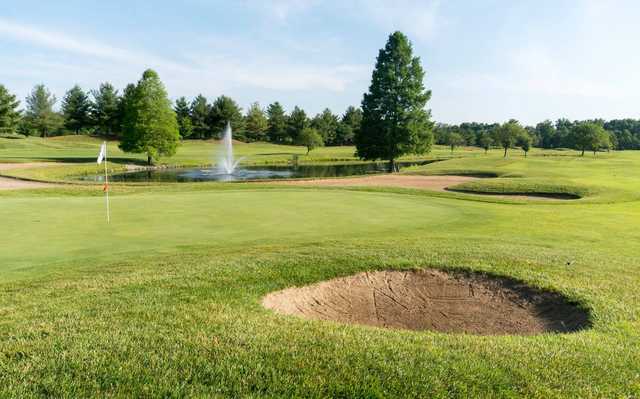 A view of a hole with water and bunkers coming into play from  Covered Bridge Golf Club .