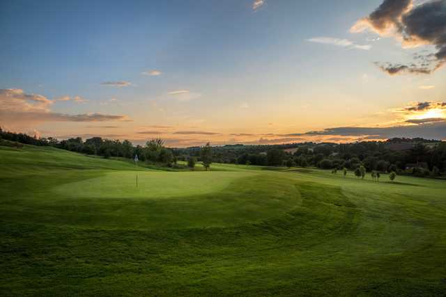 A sunset view of a green at Norwood Park Golf Centre.