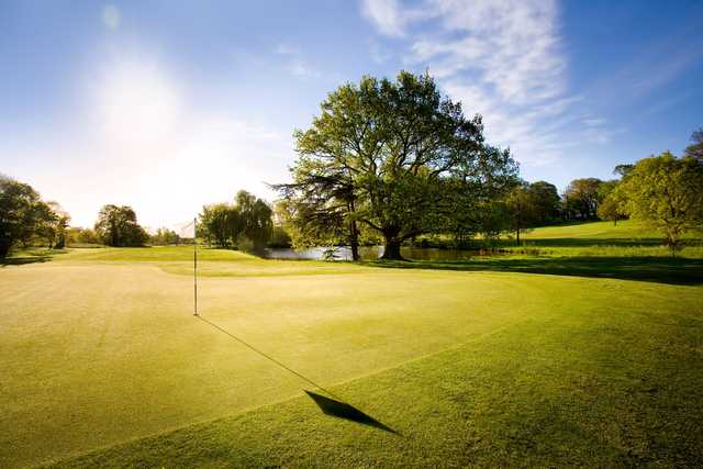 A sunny day view of a green at Norwood Course from Norwood Park Golf Centre.