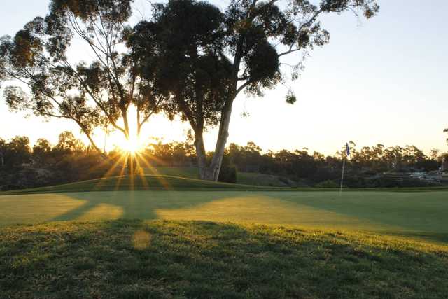 A sunny day view of a hole at Balboa Park Golf Club.