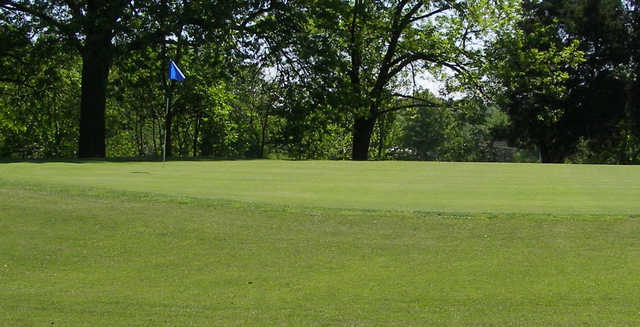 A sunny day view of a hole at Ruth Park Golf Club.