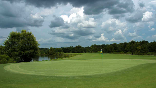 A cloudy day view of a green at West Fork Golf & Country Club.