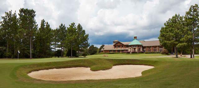 View of the 18th hole and clubhouse at The Grand Bear Golf Course