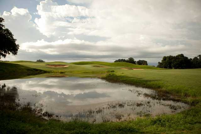 A view over a pond at SouthWood Golf Club.