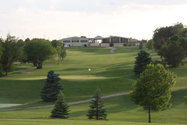 A view of the clubhouse and a green at NuMark Golf Course.