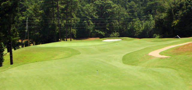 A sunny day view of a green at West Pines Golf Club.