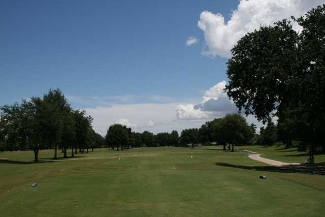 A sunny day view from a tee at Cypress Lakes Country Club.