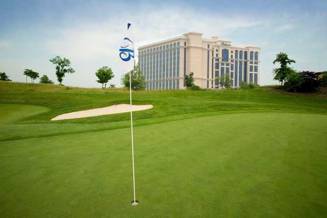 A sunny day view of a hole at Belterra Casino Golf Club.