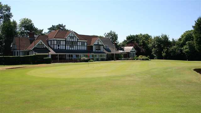 A view of the clubhouse and a green at Glamorganshire Golf Club.