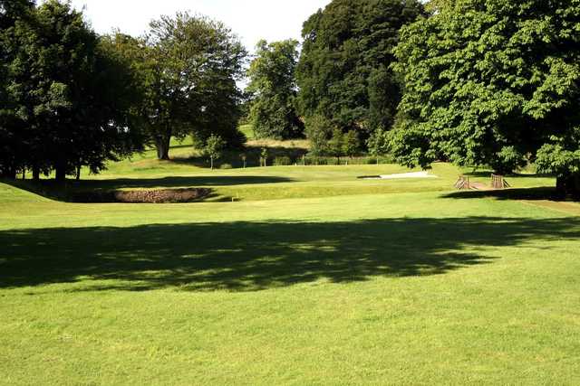 A sunny day view of a hole at Caldwell Golf Club.