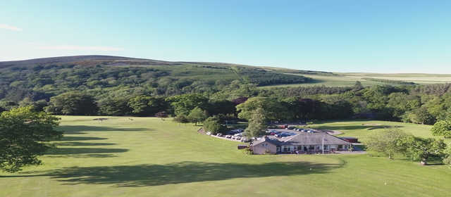 A view of a fairway and the clubhouse at Torwoodlee Golf Club.