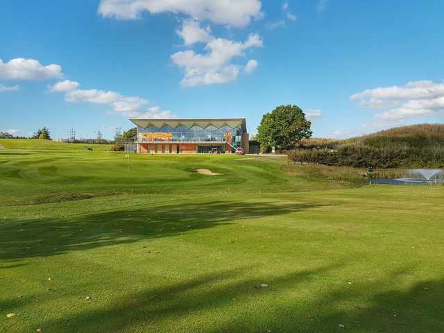 View of the 18th green and clubhouse at Radlett Park Golf Club