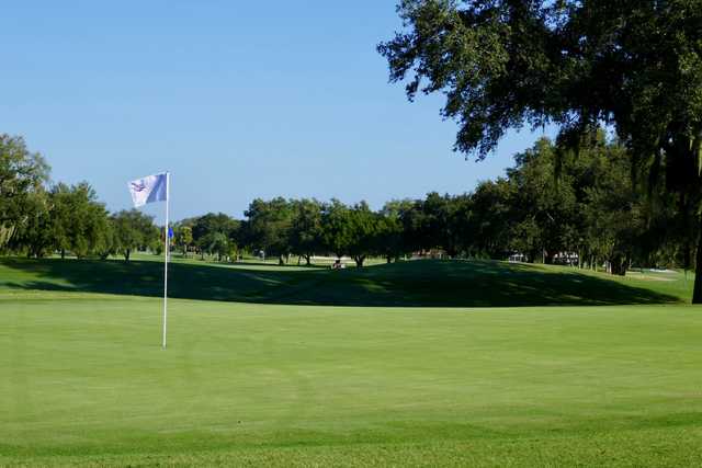 View of a green at Jacaranda West Country Club