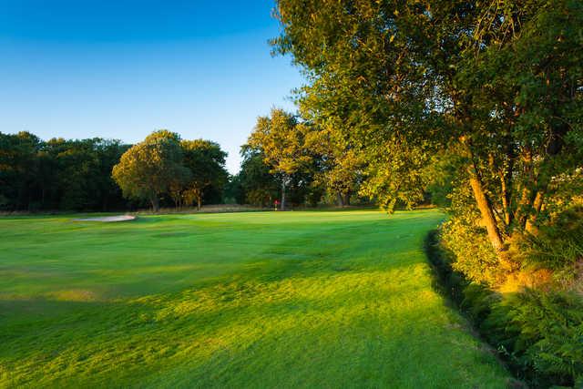 A sunny day view of a hole at Bishopbriggs Golf Club.