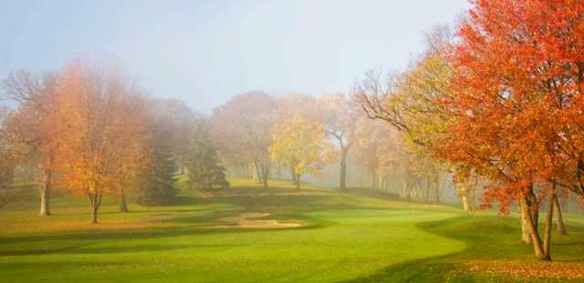 A splendid fall day view of a green at Eaglewood Resort & Spa.