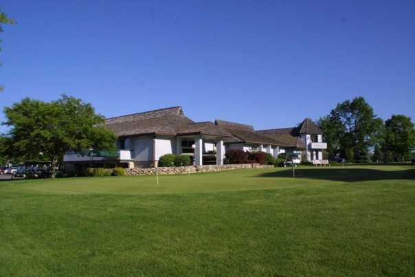 A view of the clubhouse and putting green at Foxfire Golf Club