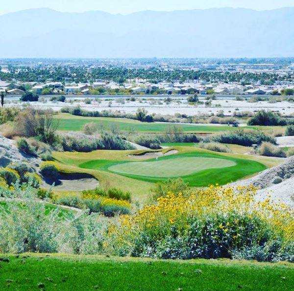 A view of a green at South Course from Golf Club At Terra Lago.