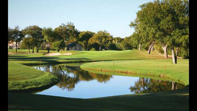 A view over the water of a hole at Brackenridge Park Golf Course.