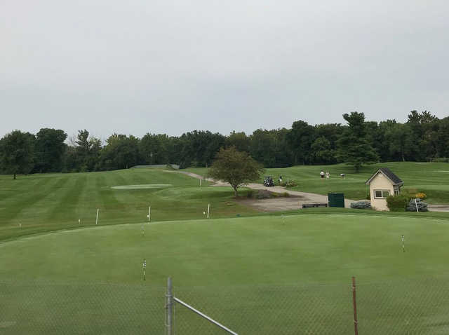 A view over the practice putting green of a tee at Brookshire Golf Club.